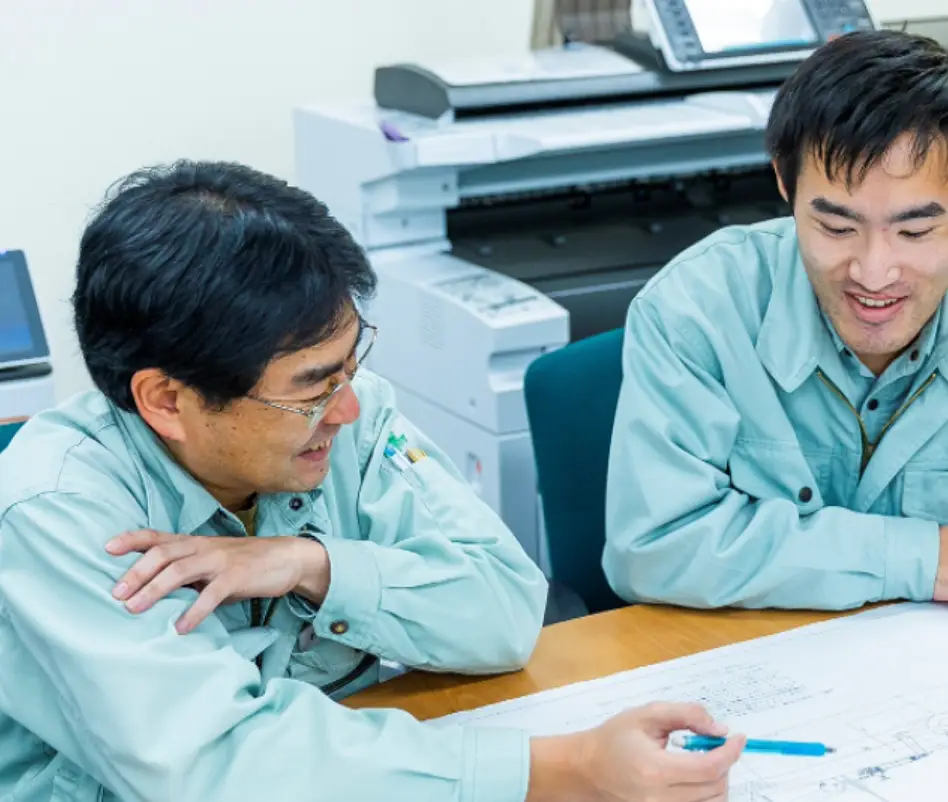 仲間と協力しチームを牽引する社員